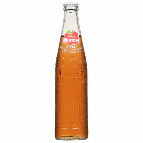 Clear glass bottle of Sidral Mundet with orange liquid on a white background